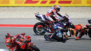 Bagnaia avoids Marquez mayhem to win MotoGP opener in Portugal