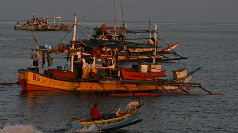 Philippine Coast Guard says 'successfully removes' barrier at disputed reef 