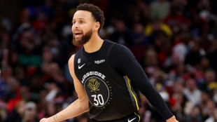 Warriors' Curry to miss at least another week