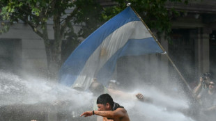 Protesters, police clash at protest over Milei labor reform