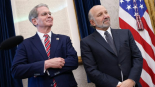 Stocks diverge awaiting China-US trade talks