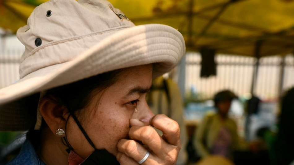 Sirens wail and families cry at Myanmar disaster site