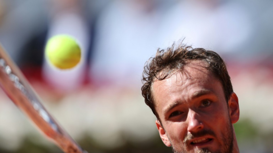 Medvedev squeezes past friend Shevchenko in Madrid