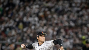 Homecoming hero Ohtani helps Japan win 'heavy' baseball opener