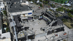 Grieving Dominicans start burying 220 victims of nightclub disaster