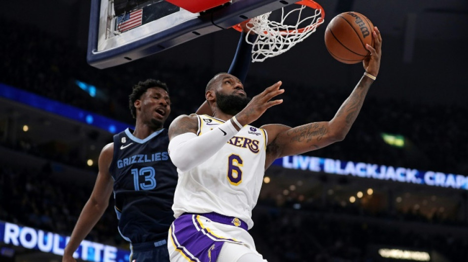 Lakers surge late for NBA win, Memphis injury scare for Morant