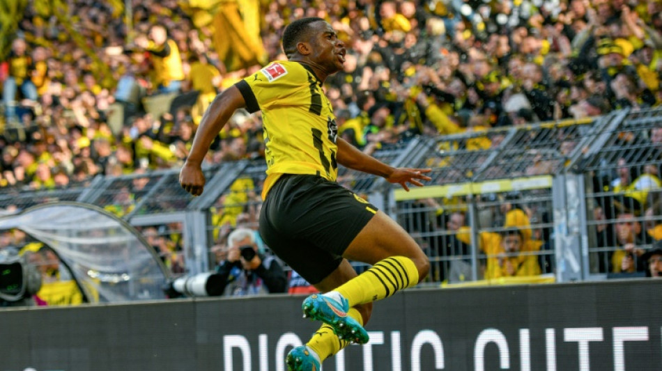 Dortmund go top as 'laissez-faire' Bayern beaten at Augsburg