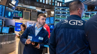 Wall Street termine en baisse, retour au calme apr&egrave;s l'euphorie