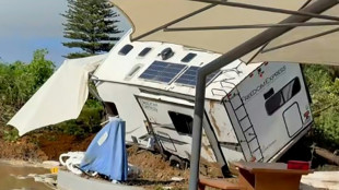 Rescuers dig for six missing in New Zealand landslide