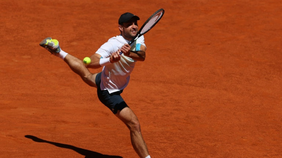 Resurgent Karatsev ends Zhang's groundbreaking run in Madrid