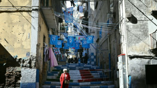 From flags to tattoos, Naples turns blue as title fever grows