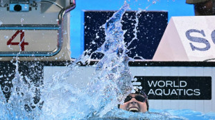 Ledecky reigns over McIntosh as record-breaking US hit back at critics