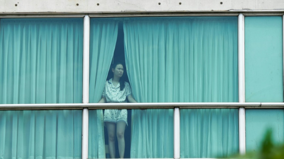 Migrantes deportados por EEUU esperan su repatriaci&oacute;n en un refugio en la selva de Panam&aacute;