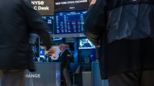 Stocks waver amid jitters over more tough central bank actions