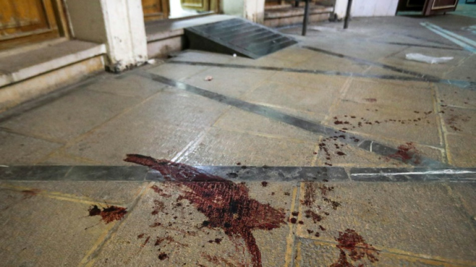 Iran arrests four more after fatal shooting at Shiite shrine