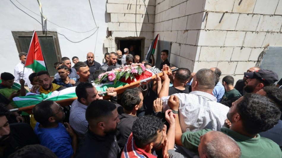 Mourners bury Palestinian killed by Israeli settlers