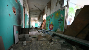 Bomb threats in Kyiv as Ukraine children go back to school