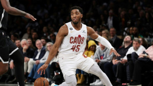 Sixers into playoffs after Cavs down Nets