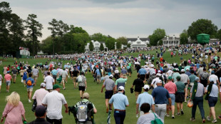 Masters play halted until Saturday