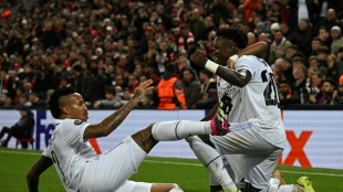 Comeback kings Madrid in their element amid European chaos