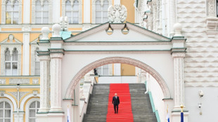 Putin says Russia dodged civil war, prepares to disarm Wagner