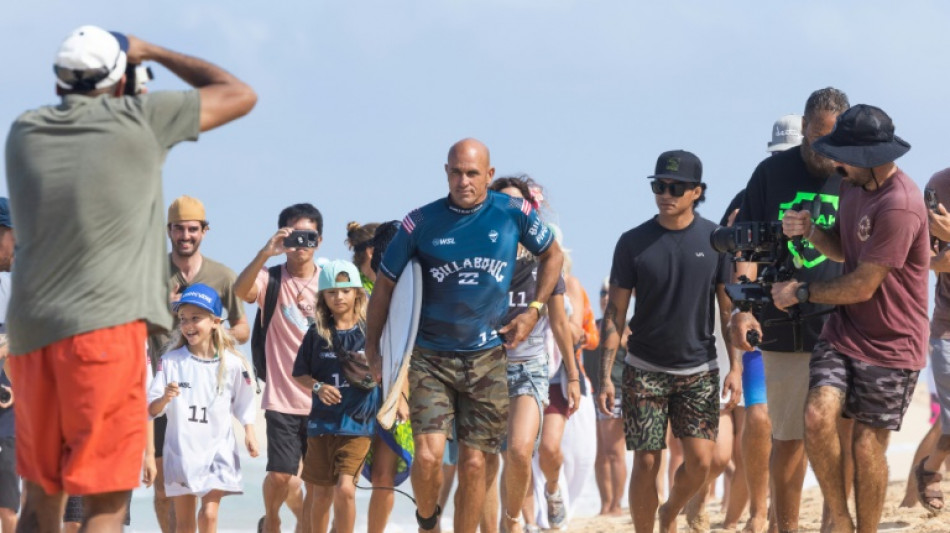 Surfing great Slater, 51, handed career and Olympic lifeline