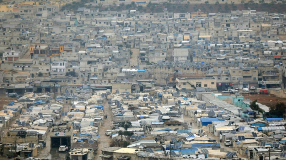 Des Syriens coinc&eacute;s dans des camps apr&egrave;s avoir trouv&eacute; leurs maisons en ruines