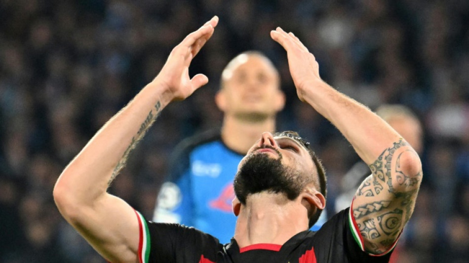Giroud seals Milan's passage past Napoli into Champions League semis