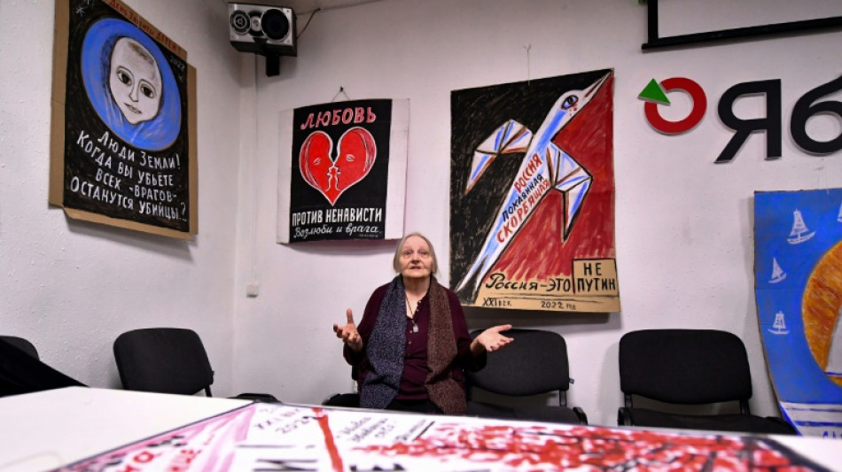 Russian police seize protest artist's work in exhibition raid