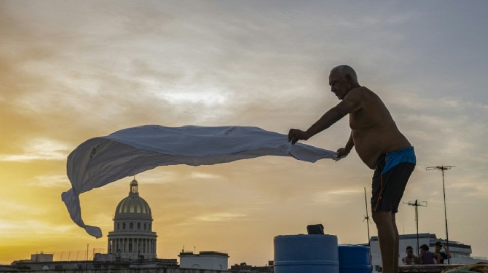 Cubans find rest on rooftops as blackouts drive them from home