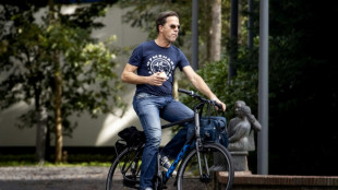 Bike-loving Rutte rides to record term as Dutch PM