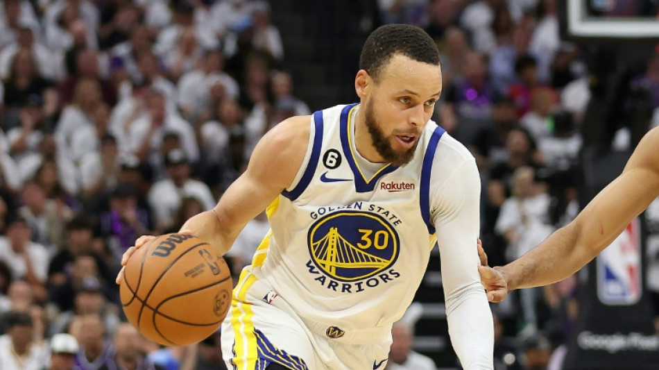 Curry hits 50 as Warriors advance, Butler hurt in Heat win