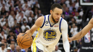 Curry hits 50 as Warriors advance, Butler hurt in Heat win