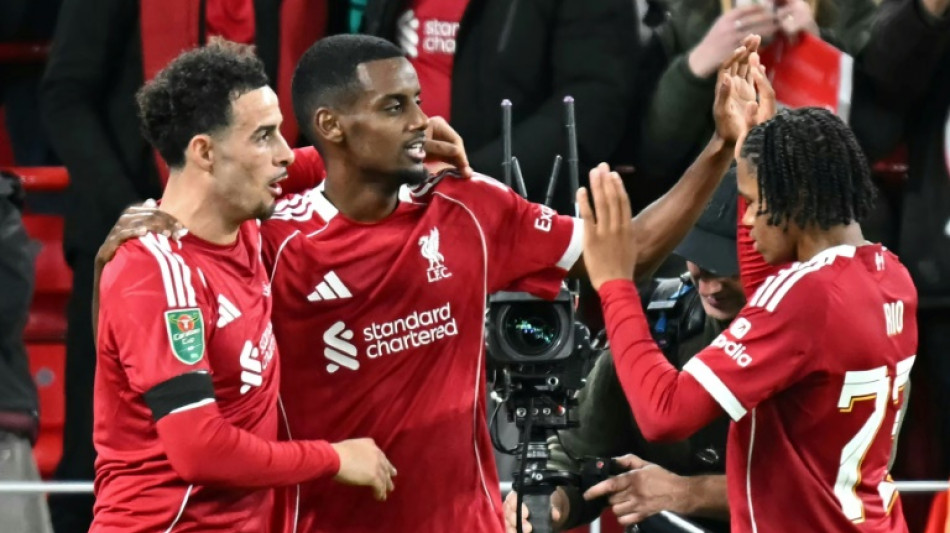 Isak scores first Liverpool goal in League Cup win, Chelsea survive scare