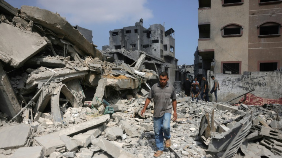 Gaza rescuers say Israeli forces kill over 50 as ceasefire calls mount