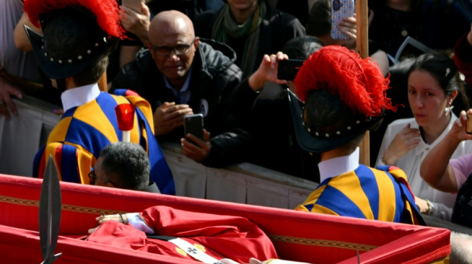Tens of thousands bid farewell to Pope Francis as he lies in state