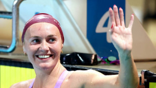 Titmus defies illness to cruise to Australian 400m free title