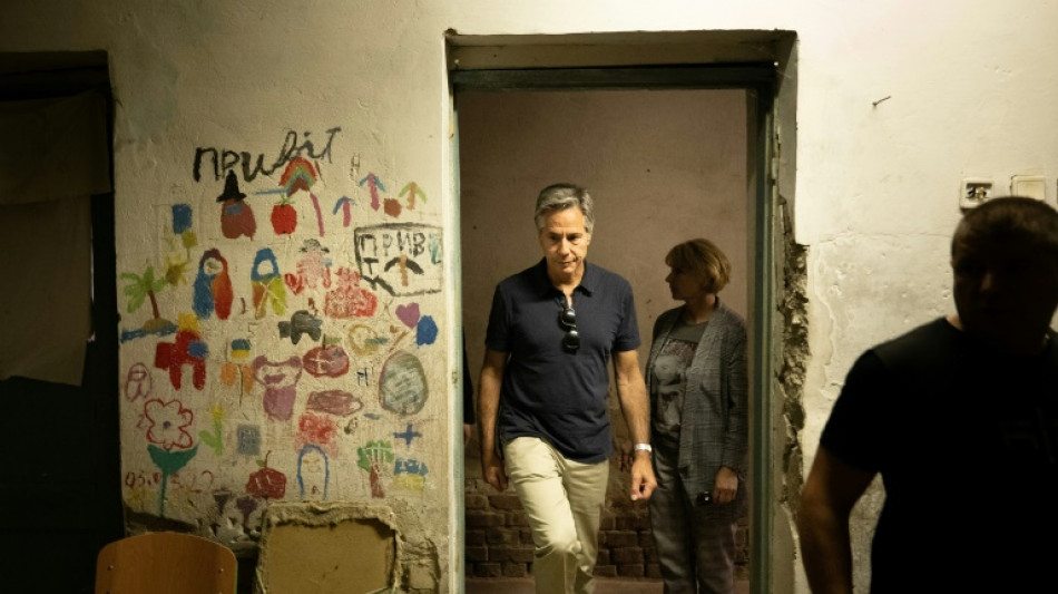 At school used as jail, Blinken hails Ukraine's 'extraordinary resilience'