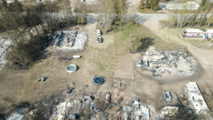 Evacuados de Canad&aacute; vuelven a casa mientras el clima m&aacute;s fresco calma los incendios