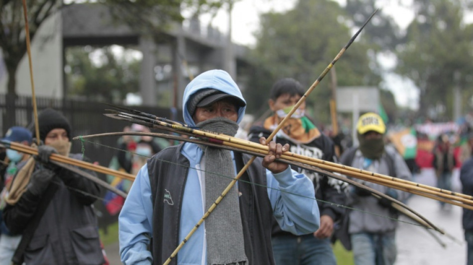 Anti-Trump protesters fire arrows at Colombian police, injuring four