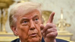 Trump says not firing Fed chair -- but not ruling out