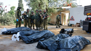 Israel retakes Gaza border area as war's toll mounts