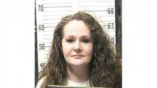 US woman who survived botched execution is awake and speaking
