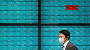Asian stocks mixed following rout on Wall Street