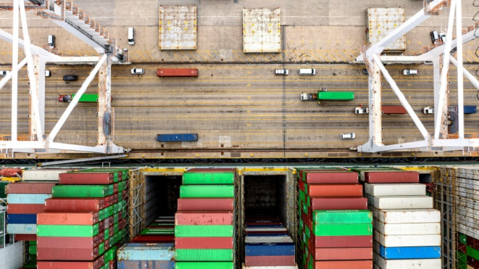 Dollar plunges, stocks wobble over trade war turmoil