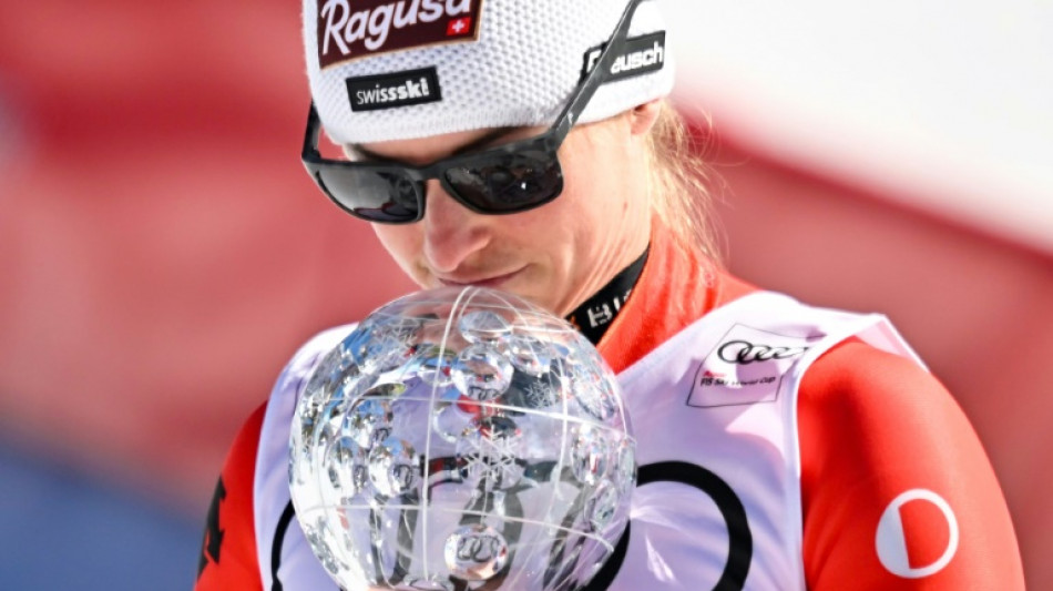 Gut-Behrami wins super-G to claim World Cup globe