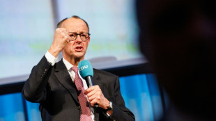 El socialdem&oacute;crata Olaf Scholz y el conservador Friedrich Merz en un pulso por el poder en Alemania