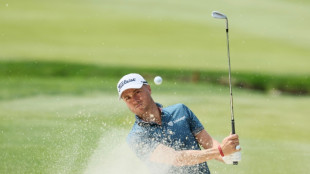 Defending champ Thomas fights through slump for PGA boost