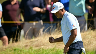 Kim leads British Open as Young charges into clubhouse lead