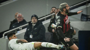 Milan hold off toothless Tottenham to reach Champions League quarter-finals